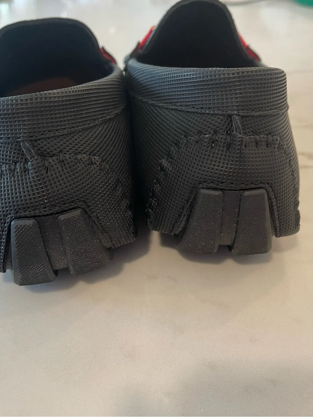 Men's Black Slip-On Loafers with Red Accent and Double-Ring Detail